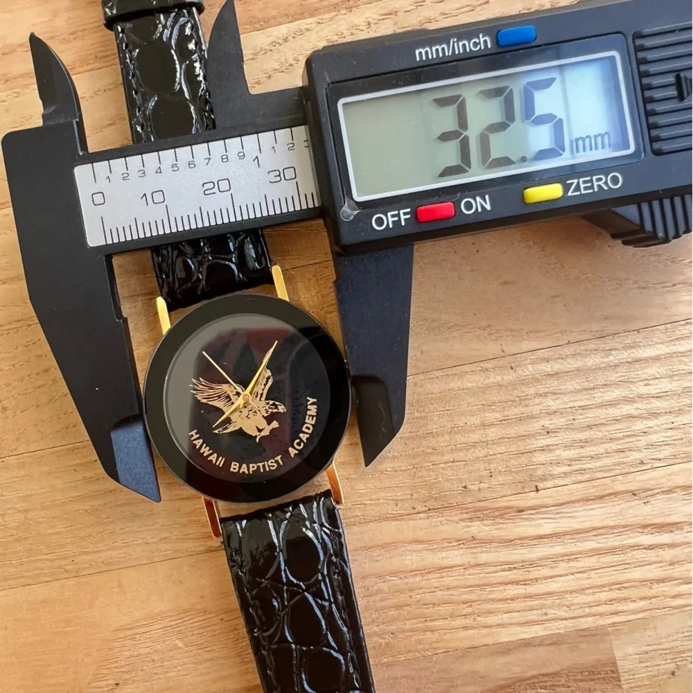 Hawaii Baptist academy black and gold tone watch NEW BATTERY